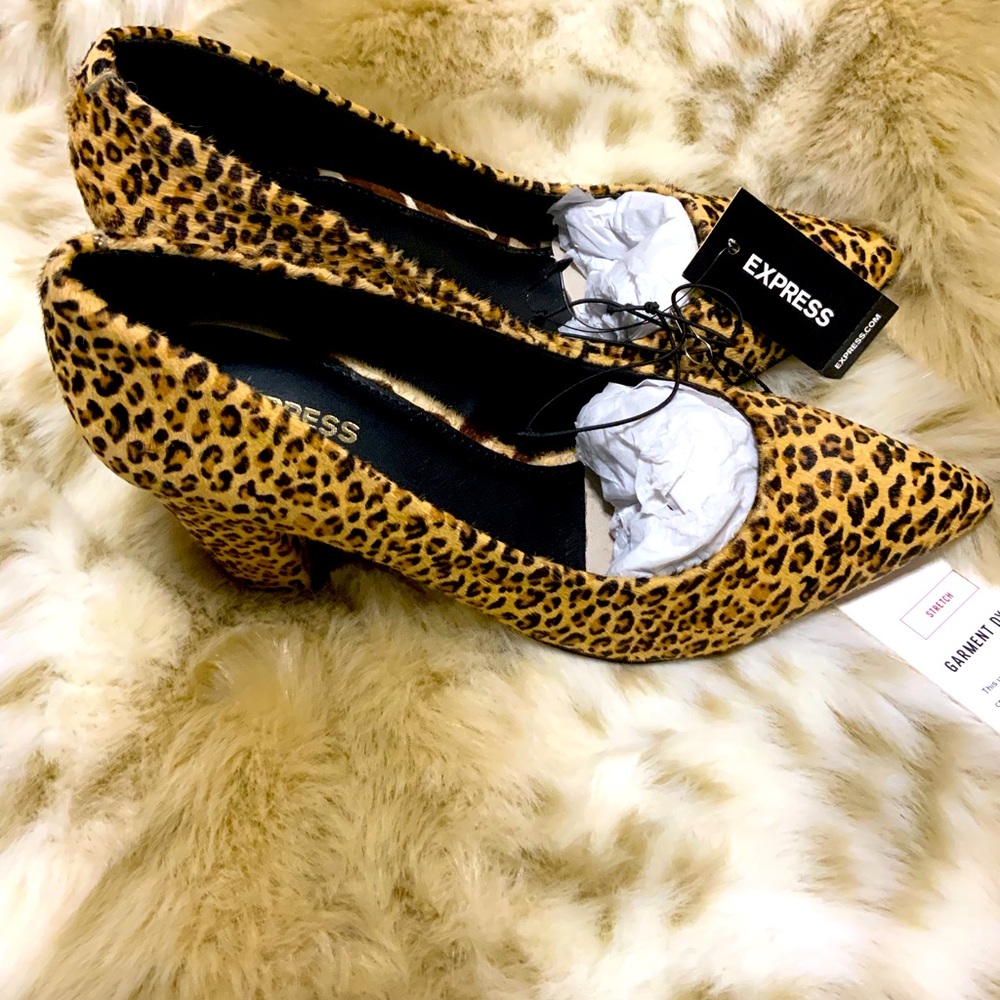 EXPRESS ANIMAL PRINT PLUM SHOE. SIZE- 7
